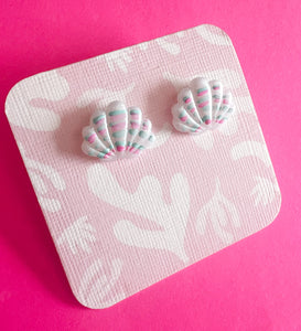 White translucent shell studs